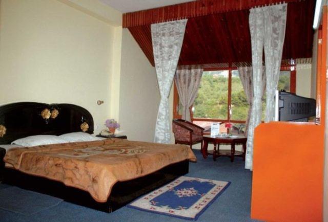 מנאלי Hotel Sitara International חדר תמונה
